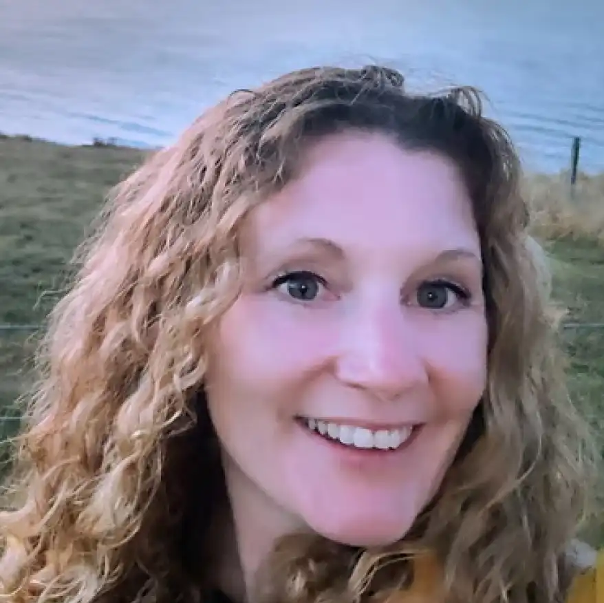 Caroline, founder and lead therapist at Hourglass Therapy, in a professional setting
